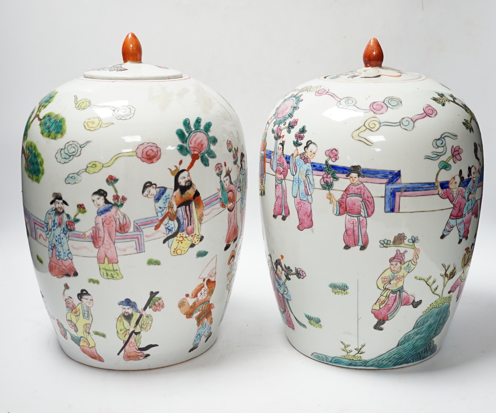 A pair of Chinese famille rose ovoid jar and covers, 32cm high